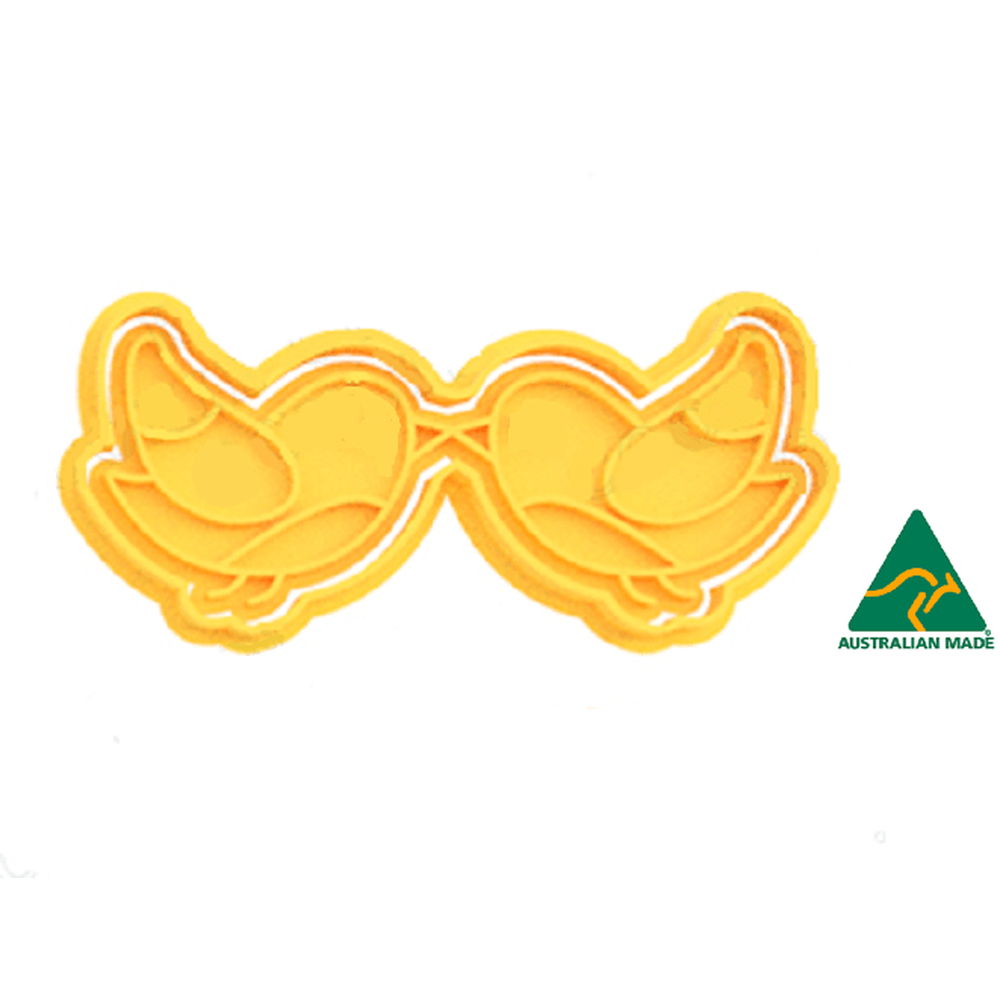yellow kissing dove's cookie cutter and embosser stamp
